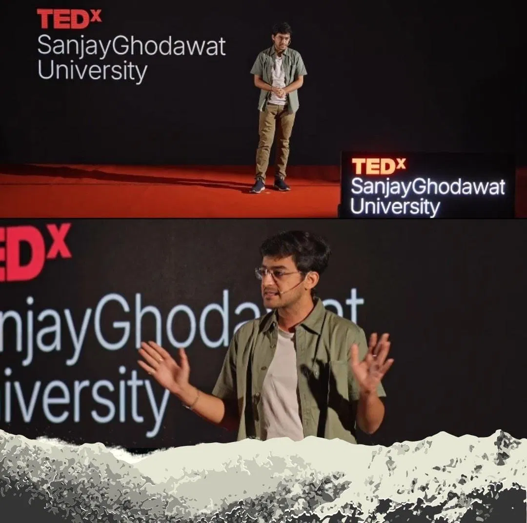 Speaker on stage, olive shirt, TEDx SGU